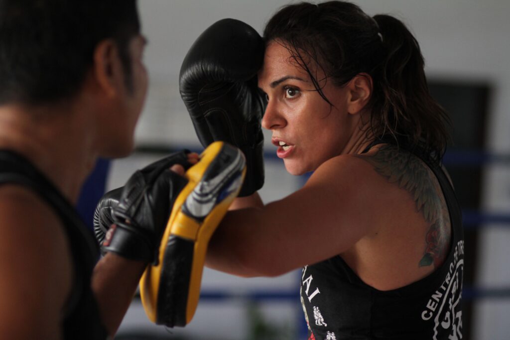 focused boxer, boxing gloves, female boxer
