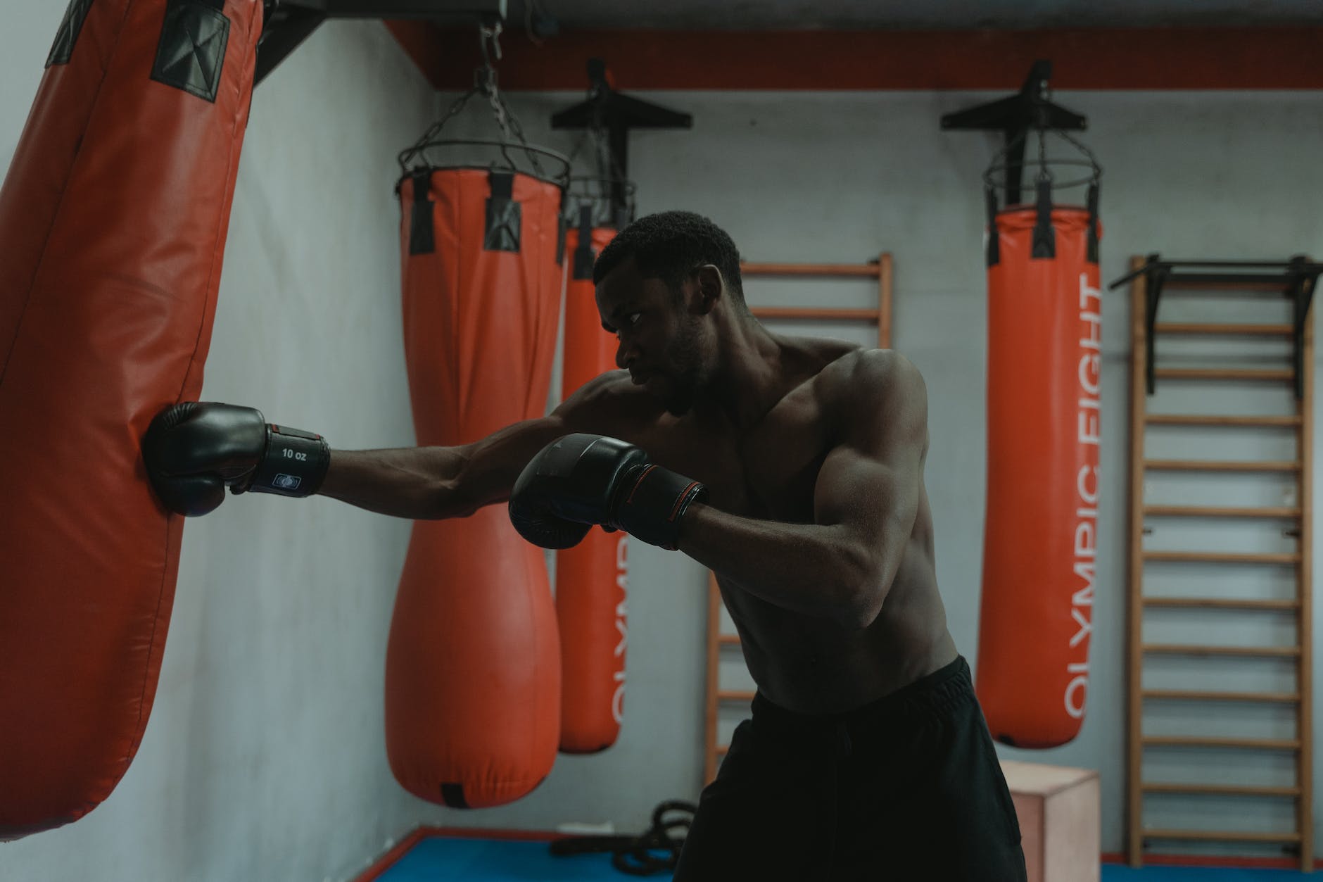 boxer punching a heavybag, boxing heavybag practice