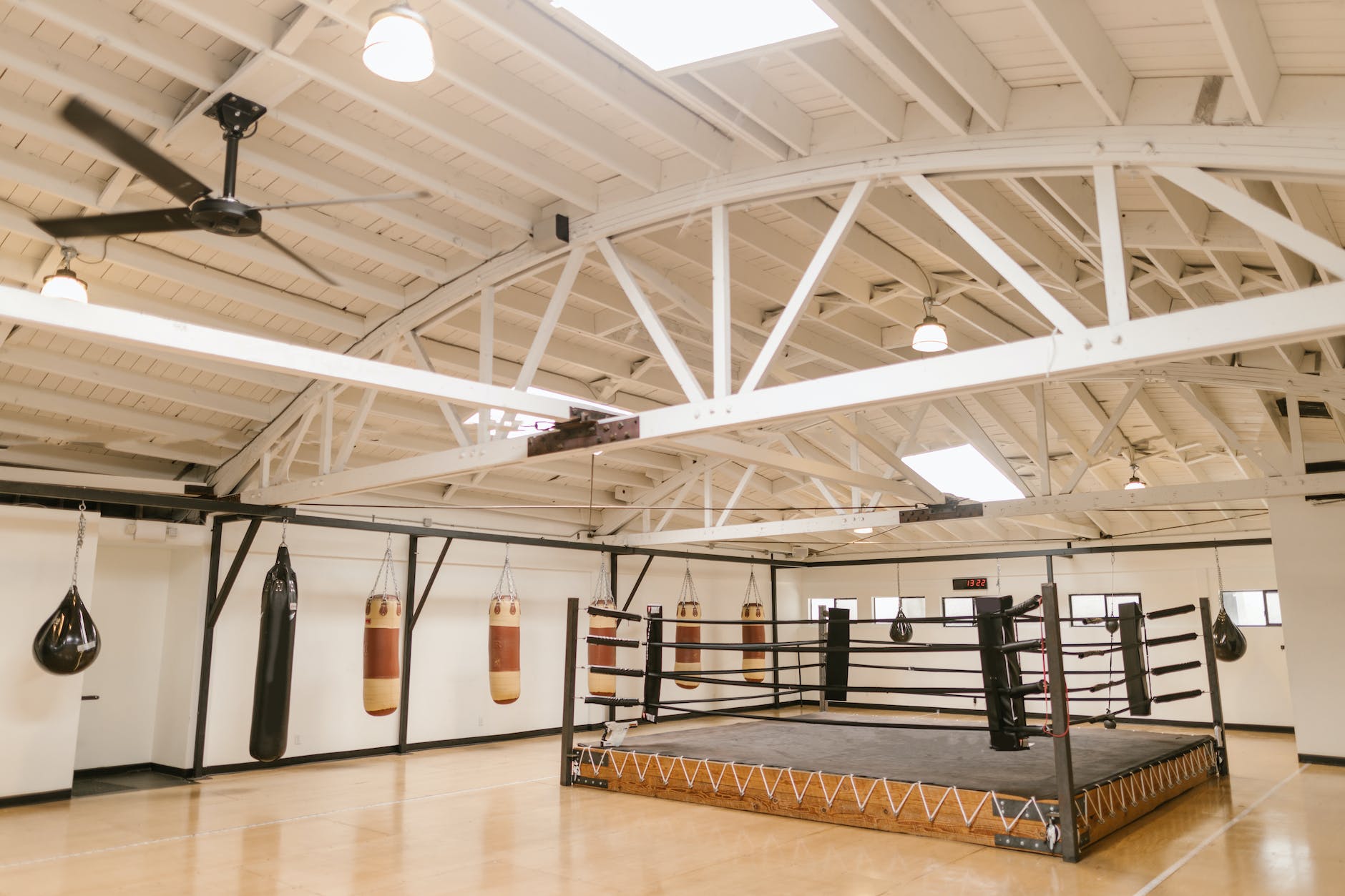 boxing gym, heavy bags, boxing ring