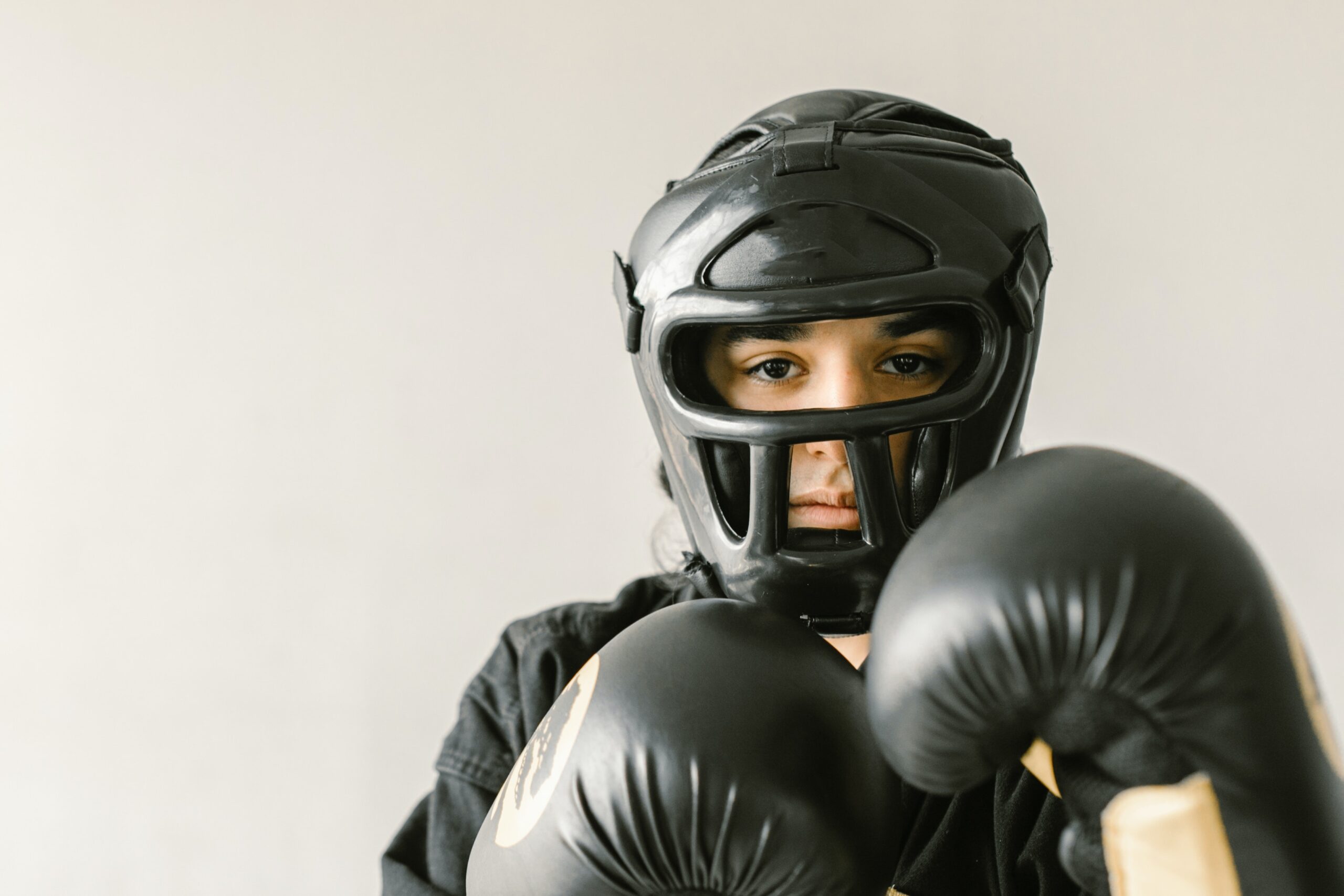 Boxer wearing a boxing helmet