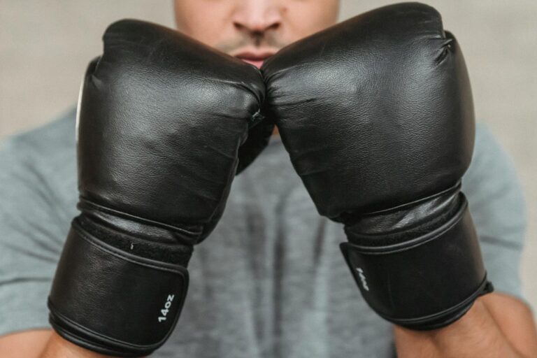 male boxer standing in defensive pose