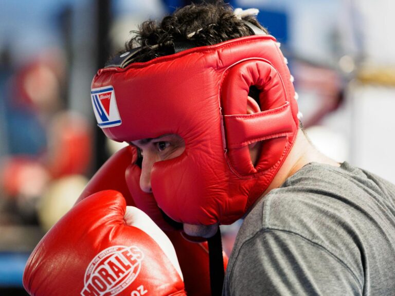 boxer in head guard and gloves, soviet boxing